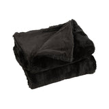 Ambiance cosy avec le plaid Cutie noir dans une chambre