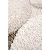 Vue rapprochée des bords du tapis recyclé Yan Neige