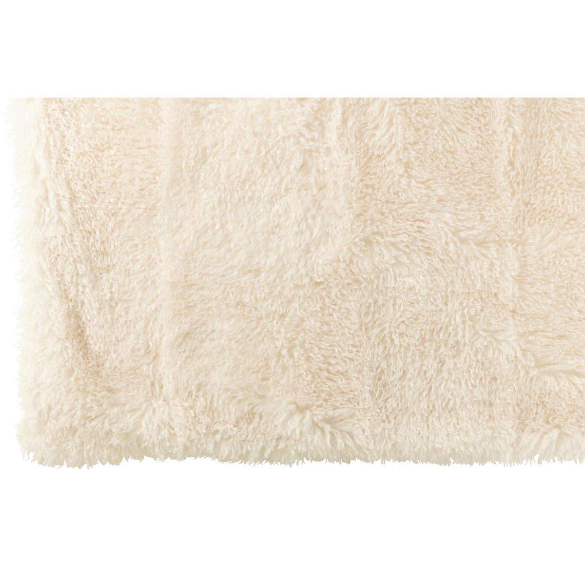 Couverture J-Line Moutie drapée sur un canapé moderne