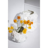 Vase en céramique blanc au look rock, design élégant et moderne.