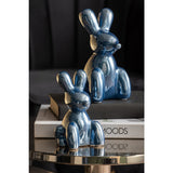 Statue Ballon Lapin Bleu en céramique dans un intérieur moderne