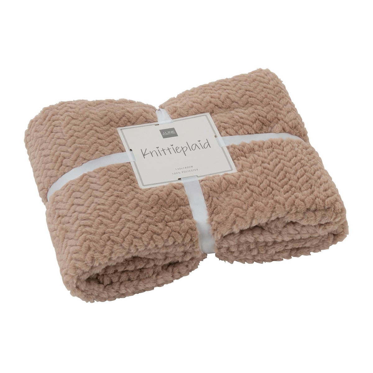 Couverture J-Line sur un lit, ambiance chaleureuse