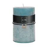 Bougie cylindrique J-Line extra large, mise en scène dans un salon moderne