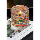 Bougeoir J-Line Perles sur une table, ambiance chaleureuse