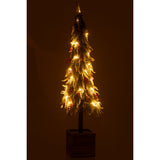 Sapin de Noël J-Line avec éclairage LED, créant une ambiance chaleureuse