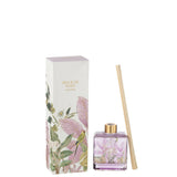 Ambiance de salle de bain avec huile parfumée J-Line, créant une atmosphère chaleureuse.