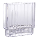 Détail du vase en verre transparent, mettant en valeur sa transparence