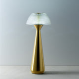 Lampe Mushlampio sur une table de chevet, ambiance chaleureuse