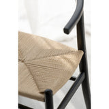 Chaise J-Line entourée de plantes d'intérieur