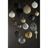 Détail de la Boule de Noël J-Line, surface en verre noir brillant