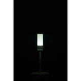 Lampe J-Line Woa sur une table moderne, ambiance cosy