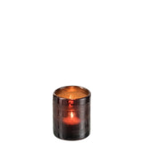 Lanterne J-Line Cylindre, mise en scène dans un salon élégant avec lumière douce.