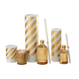 Bâtonnets parfumés J-Line Magic Sunlit Sands sur une table - ambiance chaleureuse