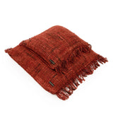 Housse de coussin Oh My Gee sur un canapé, ambiance bohème