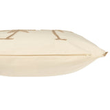 Coussin décoratif Palmiers J-Line sur un canapé moderne