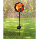 Brochette solaire Elfe sur un fond de verdure