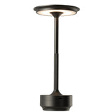 Lampe J-Liline Touch sur une table, ambiance cosy