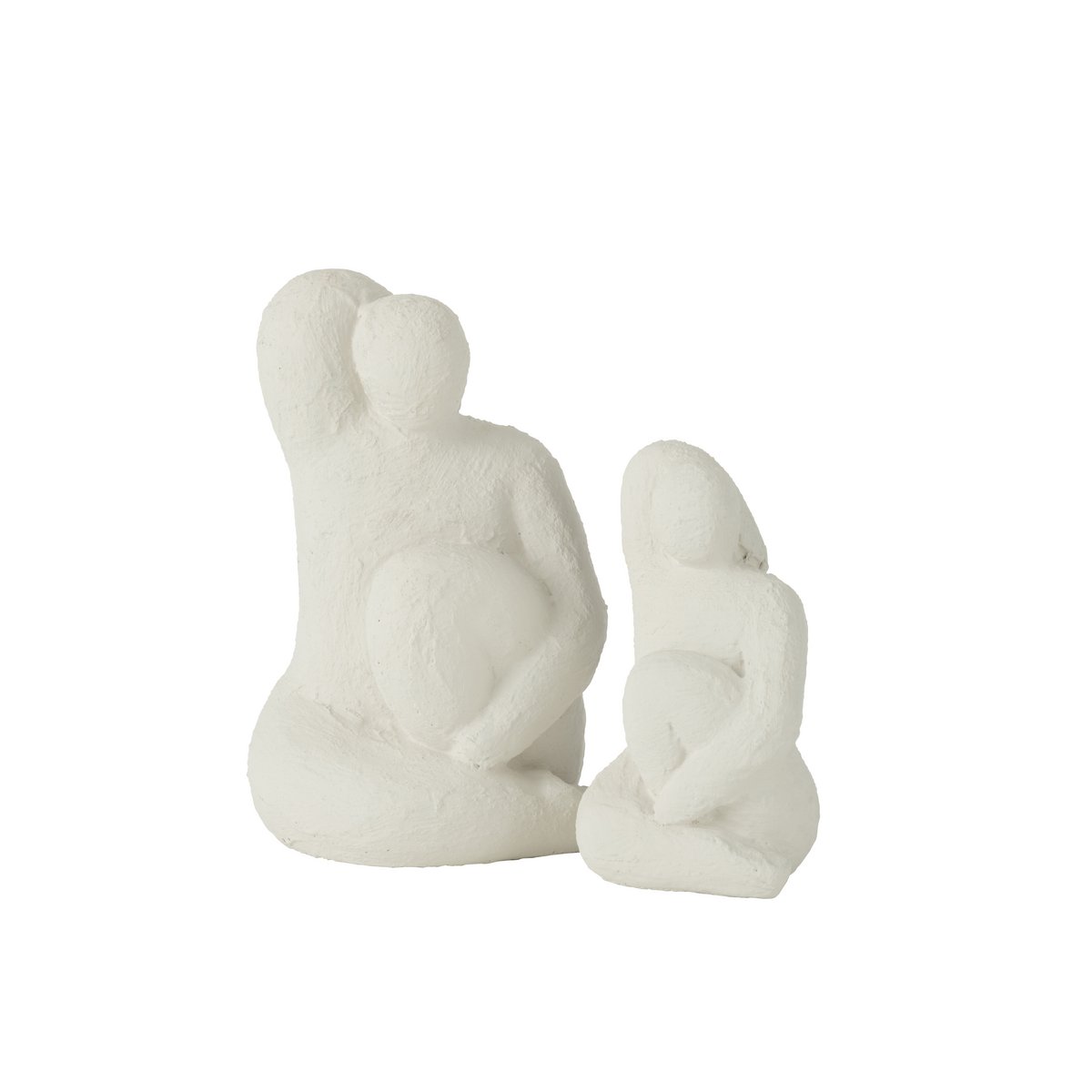 Sculpture Vénus en ciment blanc sur une table décorative, ambiance intérieure.