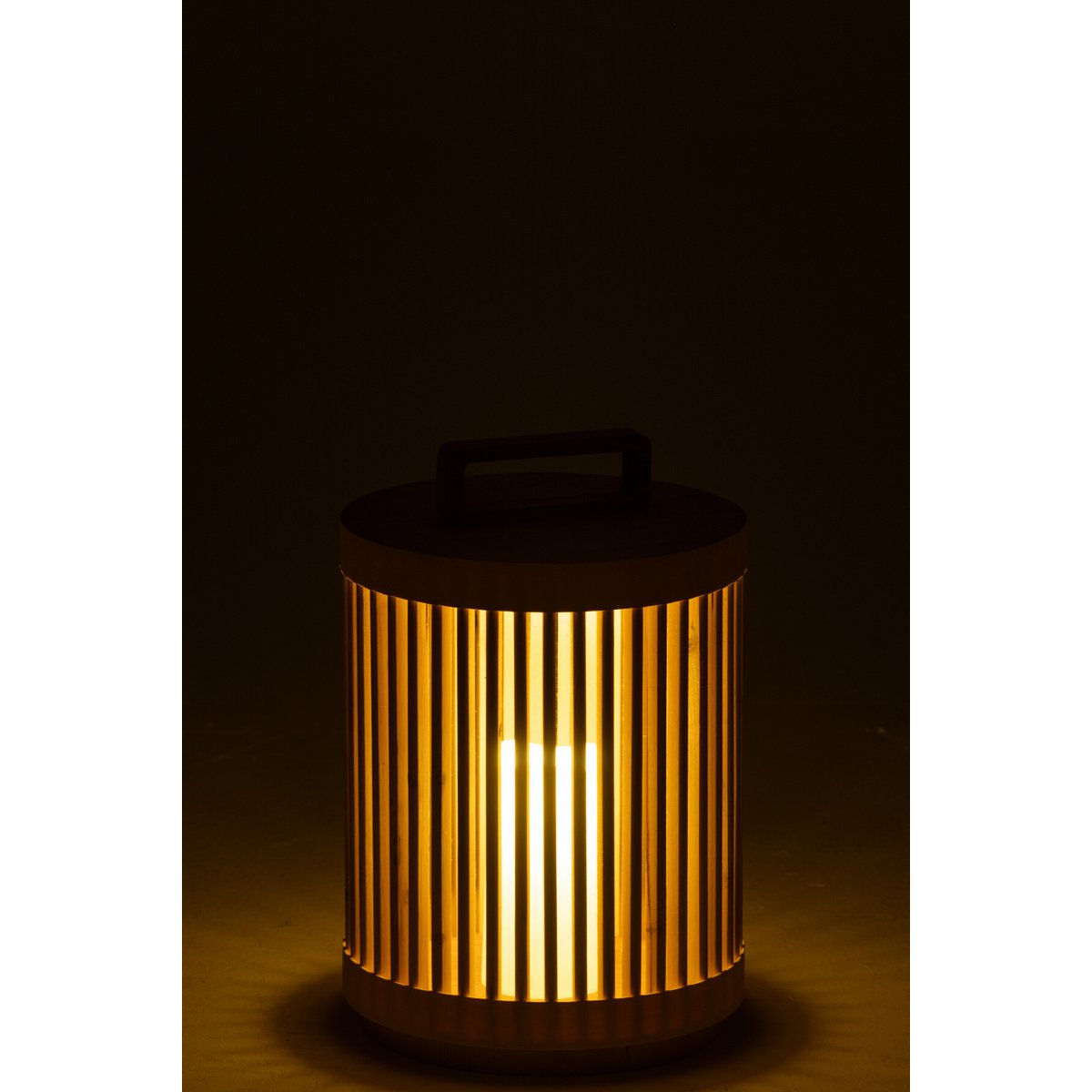 Lampe Cylindre J-Line Sparhout sur une table moderne