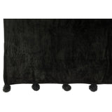 Ambiance salon avec plaid noir J-Line sur fauteuil