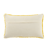 Détail du coussin Soleil tufté, mettant en avant la texture en coton.