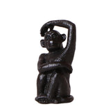 Ornement singe assis en polystone noir