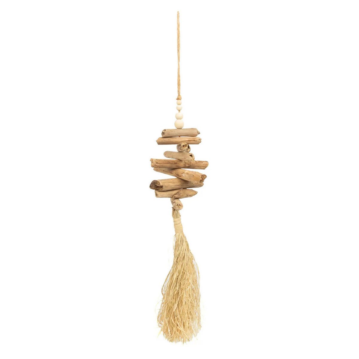 Pompon posé sur une commode en bois