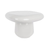 Table d'Appoint Roca sur un fond moderne, mettant en valeur sa couleur blanche.