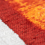 Tapis Eco orange, étiquette de la marque Louis De Poortere