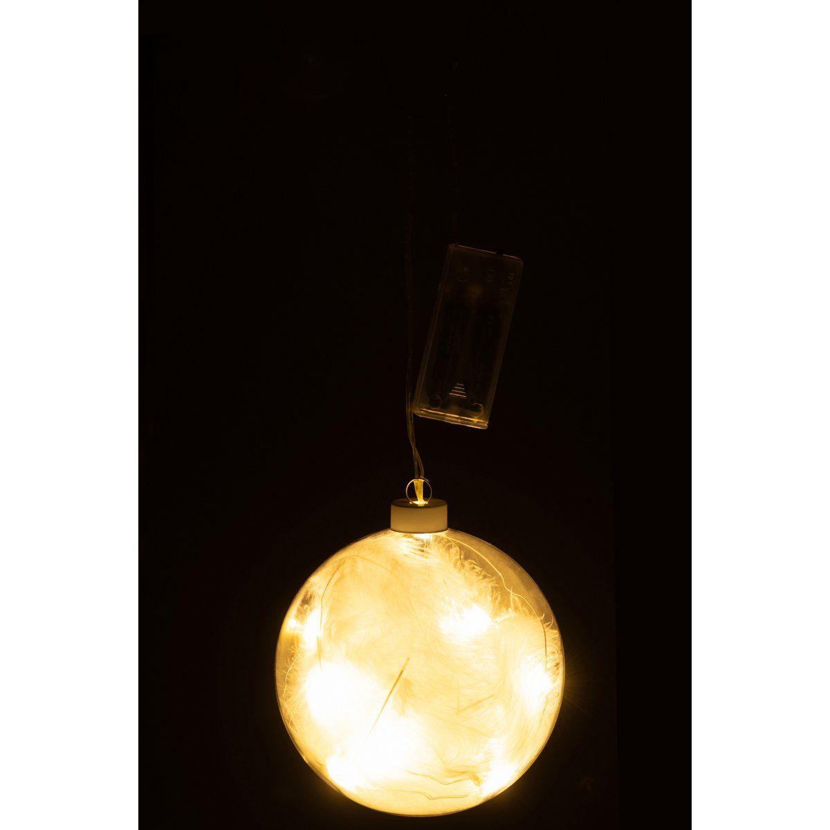 Ambiance décorative avec la boule J-Line en verre blanc dans un salon moderne.
