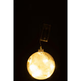 Ambiance décorative avec la boule J-Line en verre blanc dans un salon moderne.