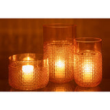 Vase J-Line Pattern en verre orange, sur table