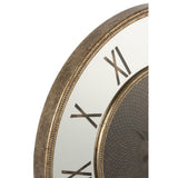 Vue rapprochée de l'horloge J-Line montrant les détails dorés