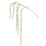 Branche Amaranthus J-Line décorant un salon moderne