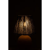 Lampe LED J-Line sur une table en bois, ambiance cosy