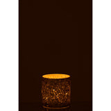 Lanterne J-Line Mosaic posée sur une table, créant une ambiance lumineuse