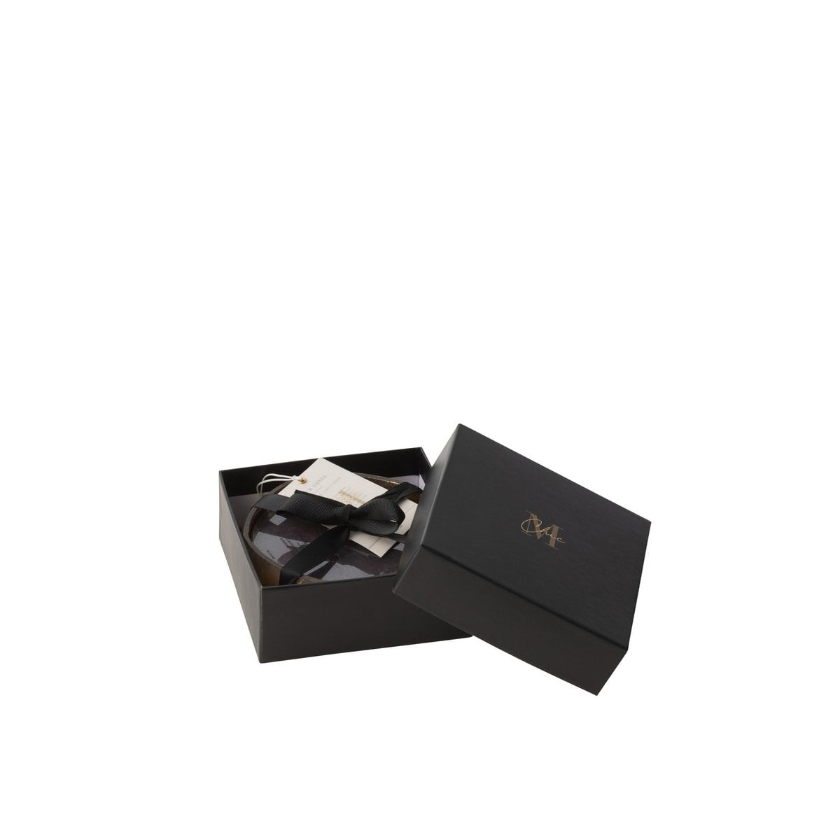 Détail de la bougie J-Line M-Chic, parfum Oud & Amber, design élégant