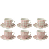 Détail de la tasse J-Line, céramique rose clair, design contemporain.