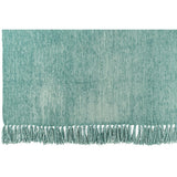 Couverture J-Line Chenille turquoise vue de face, élégante et moderne.