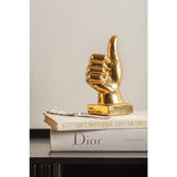 Statue OK en céramique dorée dans un intérieur moderne