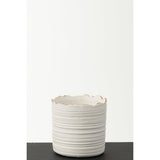 Détail du pot de fleurs J-Line, finition en porcelaine brillante et dorée