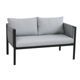 Fauteuil individuel avec accoudoirs et coussins confortables