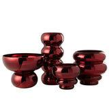 Lanterne J-Line sur socle en verre rouge foncé, ambiance cosy