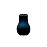 Vase DAVOS10 en verre bleu profond, vue de profil avec lumière
