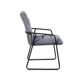 Fauteuil en velours noir et gris, vue latérale