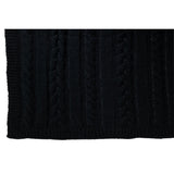 Détail du plaid torsadé noir - Style moderne et chic