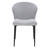 Détail du dossier arrondi des chaises grises
