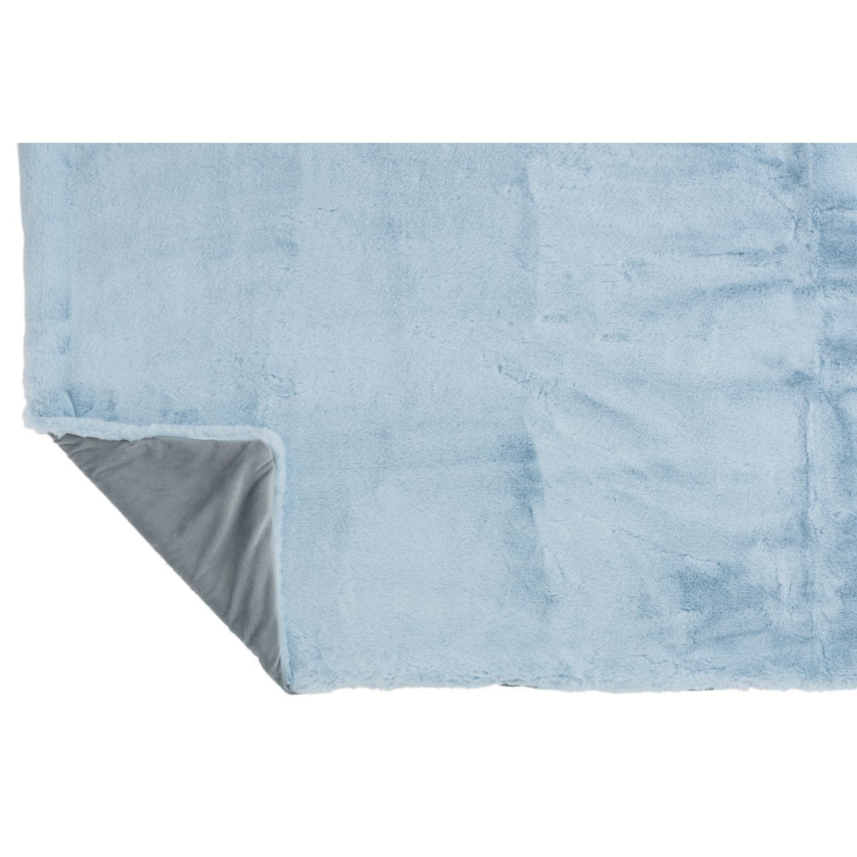 Plaid Cutie J-Line sur un lit - ambiance scandinave