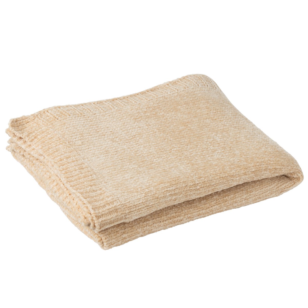 Couverture J-Line beige pliée sur un lit avec décor chic