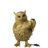 Lampe J-Line Owl sur une table en bois
